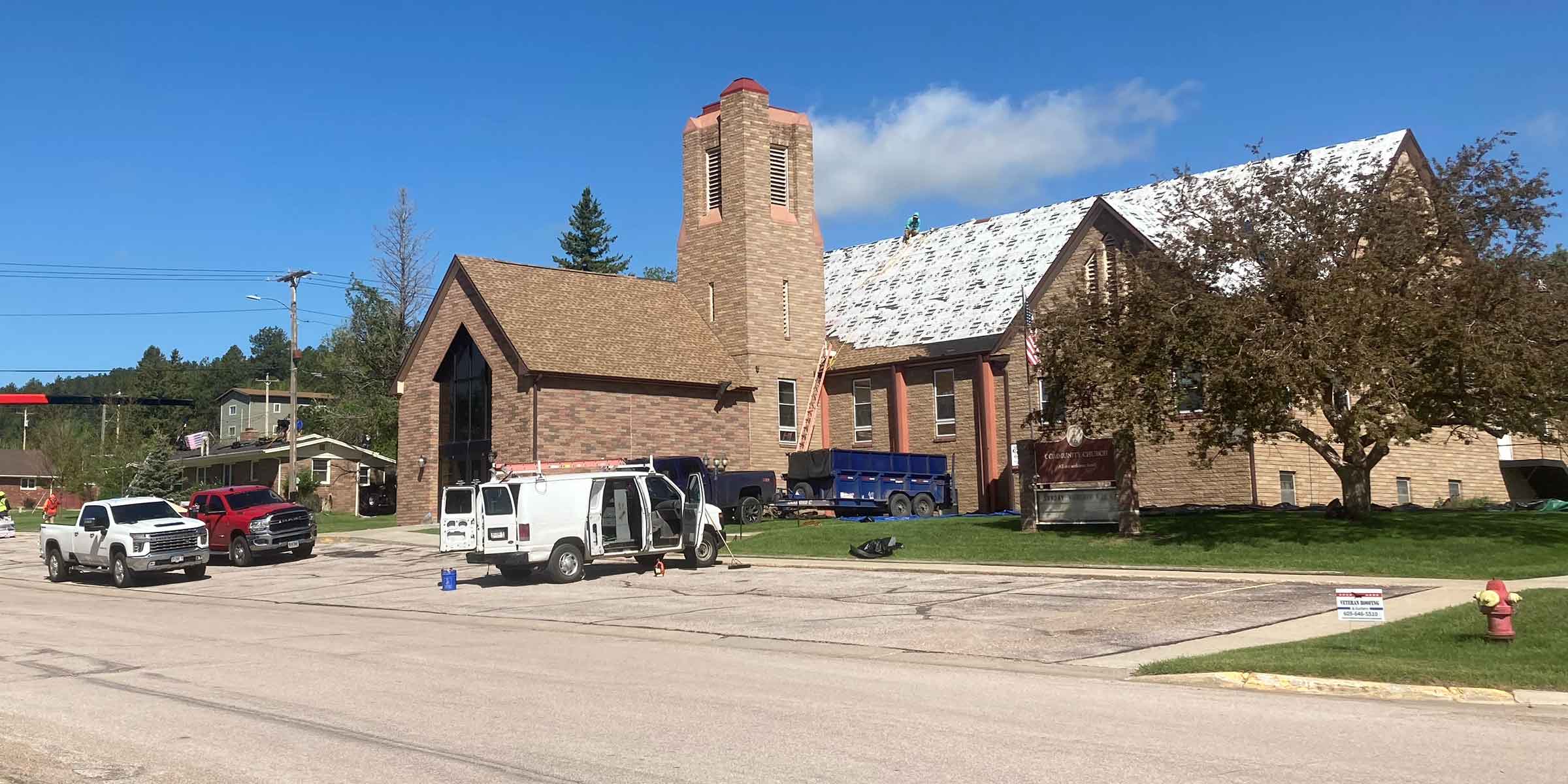 roof being worked on a church