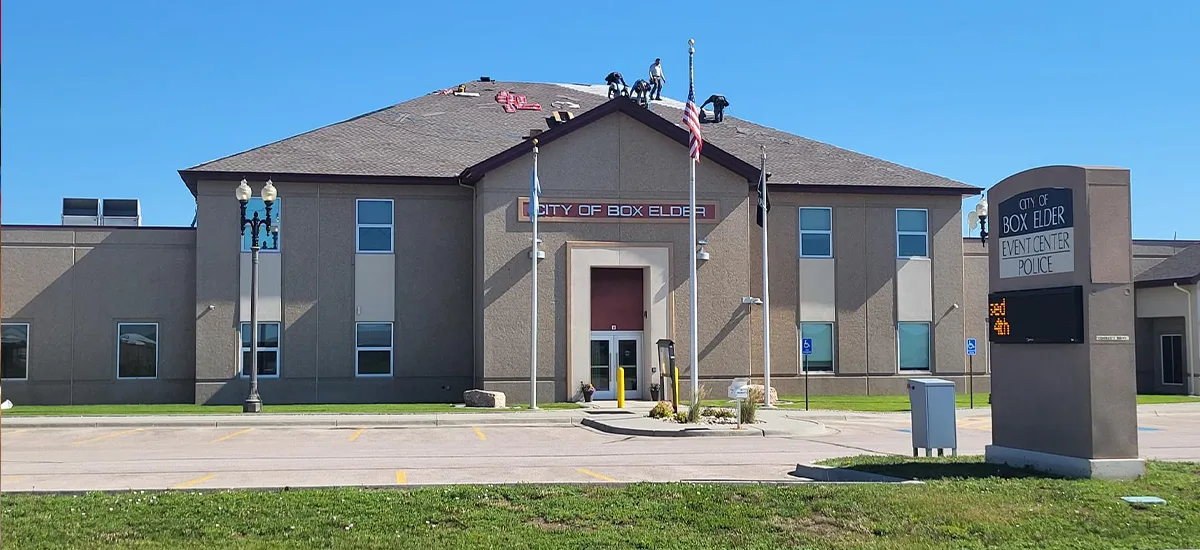 Veteran Roofing workers on a roof